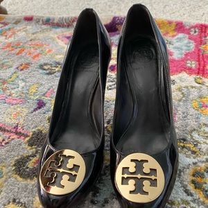 Tory Burch black patent leather pumps.